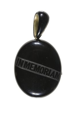  Jet Locket Pendant National Funeral Museum Collection reads IN MEMORIAM